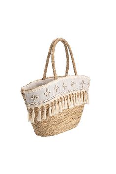 The perfect blend of coastal charm and bohemian style, the Arielle is the perfect tote bag for your summer needs. A handwoven straw design with seashell and tassel details across the front and interior drawstring closure, made for a spacious interior. Straw 22"W x 12"H x 4"D Handle Drop: 8" Drawstring Closure Unlined Fits up to a standard-size tablet Product No. YN7535SHL Melie Bianco believes in quality, craftsmanship, and affordable luxury. Their bags are made from premium vegan leather, ethic Bohemian Bucket Bag For Beach, White Bohemian Bucket Beach Bag, Bohemian Bucket Tote Bag With Tassels, Bohemian White Bucket Beach Bag, Bohemian Bucket Bag Tote With Tassels, Bohemian Tote Bucket Bag With Tassels, Bohemian Bucket Beach Bag, Bohemian Beach Bag In Natural Fiber For Vacation, White Bohemian Bucket Bag For Beach