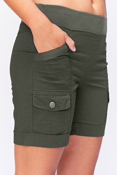 This stretch poplin short has been our best-seller since 2016. Features an elastic pull-on waist, two front pockets and two cargo pockets, clean back and twill details on front pockets. Stretch Poplin - 96/4 Cotton/Spandex. Jersey waistband - 92/8 Cotton/Spandex. Color description: Warm forest green. Inseam: ~7" Front rise: ~9.5" XS-XL: Back rise: ~15" 1X-3X: Back rise: ~18" Preshrunk. Machine washable. Imported. MODELS Megan is wearing size X-Small Height: 5'10" | Bust: 34B | Waist: 25" | Hip: Tiny Clothes, Beautiful Shorts, Women Cargos, Lifestyle Clothing, Clothing Hacks, Nice Shorts, Fashion Sewing, Shorts With Pockets, Cotton Spandex