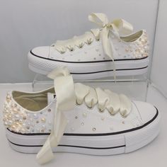 Converse Platforms embellished with : - Fully embellished backstrips with Champagne and Rose Gold Pearls and Gold and Clear Swarovski crystals - Pearls and Swarovski crystals embellished on the outsides of the shoes in a spray gradual fade effect - Finished with Beautiful full Ivory satin laces Embellished Low-top Wedding Sneakers, Embellished Lace-up Sneakers For Weddings, Champagne And Rose Gold, Outfit With Pearls, Platform Converse Outfit, Wedding Sneakers For Bride, Converse Platforms, Converse Wedding, Converse Wedding Shoes