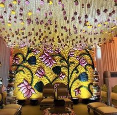 an elaborately decorated room with chandeliers and flowers on the ceiling