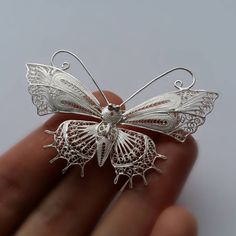 "Butterfly Brooch Mariposa Filigrana - Filigree Brooch - Butterfly Jewelry - Sterling Silver Jewelry - Filigree Jewelry - Handmade Silver Brooch Filigree - delicate jewellery technique made from silver or golden threads \"embroidering\" kind of metalwork lace that is specific to Spain, especially an Andalusian town Cordoba, where they call it a cordobese filigree. This craftsmanship has been passed from generation to generation, nonetheless nowadays there are very few craftsmen left who know to Butterfly Filigree Jewelry For Weddings, Butterfly Filigree Wedding Jewelry, Wedding Butterfly Filigree Jewelry, Intricate Design Brooches As Gifts, White Ornate Brooches For Formal Occasions, Ornate Wedding Brooches With Intricate Design, Ornate Wedding Brooch With Intricate Design, Ornate White Brooches For Formal Occasions, White Ornate Brooch For Formal Occasions