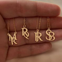 Personalize Your Style with Our Logo Name Necklace. Crafted with precision and attention to detail, this necklace is the perfect way to showcase your personal style. Metal: Stainless Steel Available in a variety of finishes: 🌹 Rose Gold 🟡 18k Gold 🥈 Silver The chain length options include: - 16" - 18" - 20" - 22" Each necklace is meticulously: ✨ Designed ✨ Polished ✨ Assembled Please note: All our items come with a 5 cm/2" extension chain. so don't hesitate about the size!! * 14" NECKLACE: Fits most like a choker * 16" NECKLACE: Falls perfectly around the base of the neck like a collar. On a petite woman it will hit your collarbone while for plus size women it might feel more like a choker. * 18" NECKLACE: A common choice for women that will fall just below the throat at the collarbone. Elegant Letter Necklaces For Personalized Gift, Elegant Letter-shaped Necklace For Personalized Gift, Elegant Letter Necklace For Personalized Gift, Elegant Personalized Letter Necklace, Elegant Letter Shaped Personalized Necklace, Metal Letter Jewelry For Gift, Metal Letter-shaped Jewelry For Gifts, Metal Letter-shaped Jewelry As Gift, Letter-shaped Metal Jewelry For Gifts