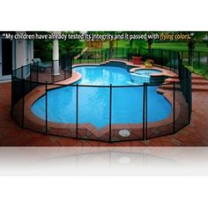 a pool with a fence around it and an above ground swimming pool in the middle