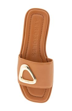 A gleaming buckle stands out at the vamp of a stylish slide sandal set on a cushioned footbed for lasting comfort. Leather upper/synthetic lining and sole Imported The Vamps, Sandal Women, Slide Sandals, Tan Leather, Nordstrom Rack, Womens Sandals, Leather Upper, Nordstrom, Buckle