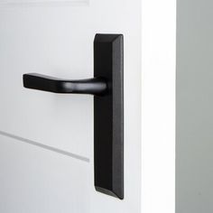 an open door with a black handle on it