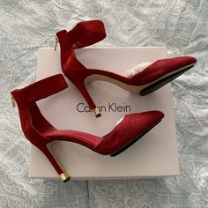 New With Box. Sold Out Everywhere. Love The Rich Red Color But A Little Too High For Me. 4" Heels With Classy Gold Detail. Never Worn, Just Tried On. Zipper On The Back. Suede Material. Prom Shoes Red Dress, Red Heels Quinceanera, Heels For Red Dress Prom, Chic Ankle-high Red Heels, Chic Red Ankle-high Heels, Elegant Red Ankle-high Heels, Elegant Ankle-high Red Heels, Calvin Klein Round Toe Heels For Party, Calvin Klein Party Heels With Round Toe