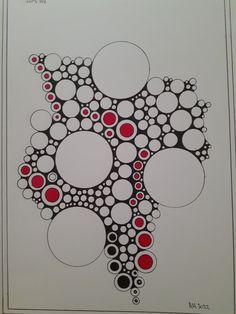 an art work with circles and dots on white paper