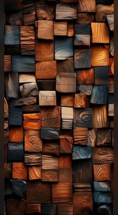 many different types of wood are stacked on top of each other in the same pattern