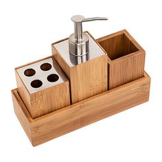 a wooden holder with three compartments and a soap dispenser