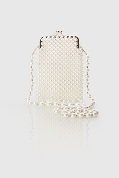 This regal and elegant clutch is completely wrapped in party-ready embellished rhinestones detailing, which sets the stage for a Roaring 20s party. Features: High quality imitation pearls Detachable chain length: 45.3 inch / 115 cm Unique kiss lock closure 3 inch / 13.5 cm x 6.5 inch / 16.5 cm ( L x H ) 20s Party, Roaring 20s Party, Elegant Clutch, Womens Handbag, Mini Slip, Roaring 20s, Ladies Clutch, Mini Slip Dress, Evening Clutch