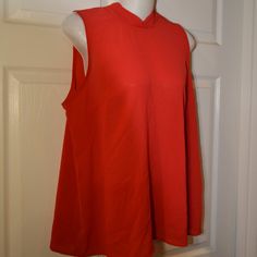 100% Polyester Red Sleeveless Top For Fall, Red Stretch Top For Work, Red Stretch Top For Workwear, Red Stretch Tops For Work, Red Stretch Sleeveless Blouse, Red Spring Workwear Tops, Red Summer Top For Workwear, Red Tops For Workwear In Spring, Red Tops For Spring Workwear