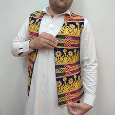 Beautiful Afghani Multi color waistcoat gold tune work. Our amazing embroidered Afghani waistcoat is the absolute ultimate . And the colors will knock your socks off. Embroider the hell out of them. And you get this, an extraordinary piece of outerwear for Men And Women. We Deliver Worldwide . Festive Vest With Multicolor Embroidery, Festive Embroidered Multicolored Vest, Festive Embroidered Vest With Multicolor Embroidery, Traditional Multicolor Festive Vest, Festive Multicolor Embroidered Vest, Festive Embroidered Cotton Vest, Traditional Cotton Vest For Festivals, Embroidered Multicolor Vest For Festivals, Traditional Embroidered Festive Vest