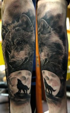 a man's leg with a wolf and moon tattoo on it