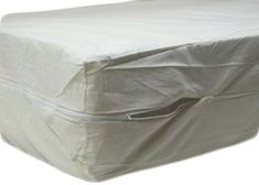 the mattress is covered with a sheet and zippered to it's back end