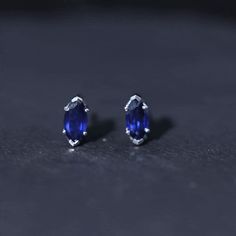 Product Details These Solitaire Stud Earrings featuring Marquise Cut Created Blue Sapphire as Solitaire in a prong setting, crafted in Solid Gold. Product Information SKU SHP-EARRINGS042170978 Length 9 mm Width 4 mm Weight 1.04 gm (Approximate) LAB CREATED BLUE SAPPHIRE INFORMATION No.of Stones 2 Pieces Total Weight 1.50 Carat (Approximate) Dimension(approx) Marquise-4X8 mm-2 Pcs Color Blue Cut Brilliant Shape Marquise Setting Type Prong-Setting Quality Grade AAAA View More Blue Birthstone Earrings For Formal Occasions, Formal Blue Birthstone Earrings, Blue Marquise Earrings For Anniversary, Elegant Blue Marquise Jewelry, Blue Gemstone Earrings For Formal Occasions, Blue Sapphire Earrings For Gift, Sapphire Blue Earrings For Gift, Blue Fine Jewelry Earrings For Formal Occasions, Blue Oval 14k Gold Earrings