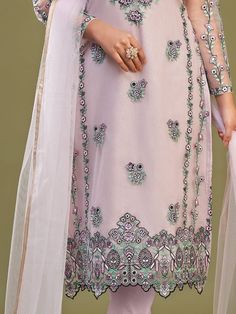 Introducing the "bewitching pink embroidered net designer pant suit with dupatta" from Ethnic Plus. This stunning pink suit is made from high-quality net material, adorned with beautiful multi-thread embroidered work.
With its elegant pink color and intricate embroidery, this suit is perfect for any special occasion. Whether it's a festival, wedding, or reception, you'll be sure to turn heads in this eye-catching outfit.
The suit comes with a similar color benglori silk material pants, adding a Pink Bollywood Lawn Suit With Zari Work, Pink Lawn Suit With Resham Embroidery For Wedding, Festive Pink Georgette Lawn Suit, Diwali Pink Lawn Suit With Zari Work, Pink Bollywood Lawn Suit For Festivals, Pink Lawn Suit For Wedding And Diwali, Pink Semi-stitched Lawn Suit With Zari Work, Designer Pink Churidar With Chikankari Embroidery, Designer Pink Organza Churidar