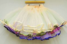 SUBSCRIBE INSPIRATION ADVICE FIND A SUPPLIER SHOP DIY TUTORIAL: MULTI-LAYERED TULLE PETTICOAT (MAKE YOUR OWN RAINBOW PETTICOAT!) Kat November 5, 2011 First up, I have to say a huge thank you to everyone that’s emailed me with their DIY ideas. I’ve has a huge response and I’m really looking forward to sharing them with you over these coming weeks. Be sure to keep them coming! I’m starting with this amazing underskirt tutorial by Alexandra King, an independent designer from Somerset. Alexan Sewing Practice, Sewing Skirts, Diy Tutorials, Diy Couture, Tutu Skirt, Sewing For Kids