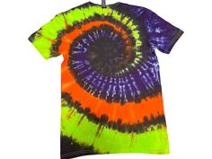 a tie - dyed shirt with an orange, purple and green spiral design on it