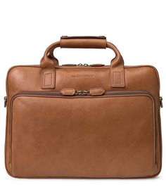 From Johnston & Murphy&#x2C; the Men's Rhodes briefcase features:Smooth&#x2C; full-grain steer leatherCotton twill lining in signature J&M custom plaidTop main compartment includes highly padded laptop section for up to 15" laptop&#x2C; large open pocket full length zip pocketInterior zip pocket for personal accessoriesLarge front-zip pocket with organization panel with four pockets&#x2C;one card pocket&#x2C; three pen loops&#x2C; an Rectangular Cognac Luggage With Sleeve, Rectangular Cases For Business Trips, Classic Cognac Rectangular Laptop Bag, Classic Rectangular Laptop Bag In Cognac, Rectangular Business Cases, Classic Rectangular Bag With Luggage Sleeve, Classic Cognac Business Travel Bag, Classic Business Luggage With Leather Lining, Classic Cognac Travel Bag For Business