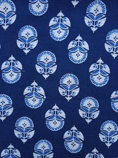 blue and white fabric with circular designs on it