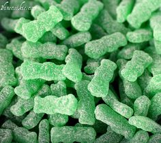 green gummy bears are shown in close up