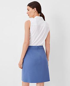 Elevate your wardrobe with the Ann Taylor Seamed Short A-Line Skirt, a testament to timeless elegance and comfort. This skirt is meticulously crafted from a blend of 33% viscose, 32% polyester, 30% recycled polyester, and 5% spandex, ensuring both sustainability and stretch for a perfect fit.

- **Size**: 16 Regular
- **Color**: Precious Sapphire
- **Material**: Viscose, Polyester, Recycled Polyester, Spandex
- **Length**: 21 inches long
- **Closure**: Hidden back zipper with hook-and-eye
- **Li Stretch A-line Skirt For Work, Elegant A-line Skort For Workwear, Elegant A-line Skort For Work, Classic Fitted A-line Bottoms, Fitted A-line Elastane Bottoms, Stretch Flared Skort For Work, Chic Elastane Skort For Work, A-line Skort For Workwear, Fitted A-line Skirt For Workwear