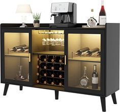 a cabinet with wine bottles and glasses in it