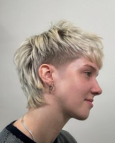 Soft Mullet Is A Low-Maintenance And Cool Style You Need To Try Female Fade Haircut Short Hair, Womens Modern Mullet, Modern Mullet Shaved Sides, Womens Mullet Short, Modern Mullet Women Straight Hair, Sides Shaved Women, Female Mullet Shaved Sides, Queer Mullet Shaved Sides, Short Mohawk Women