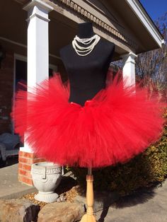 "This listing includes a red dual length tutu with a red ribbon. (Please note that this can be custom made to your color specifications.) This listing if for waist sizes up to 35\" up to 45\" can be made larger or smaller if interested contact me for the link to the correct listing. Other colors also available. The first five pictures show the length range of 13-18\" length range with a longest layer of 18\" and top layer of 13\"LAST PICTURE SHOWS WHAT IT LOOKS LIKE ON. She is wearing a 13\" len Maternity Tutu, Bachelorette Tutu, Adult Cake Smash, Dance Tutus, Red Tutu, Princess Tutu, Baby Tutu, Glitter Ribbon, Pink Tutu