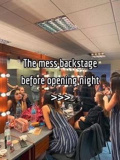 a group of women sitting at a table in front of a mirror with the caption'the mess backstage before opening night > > > > >