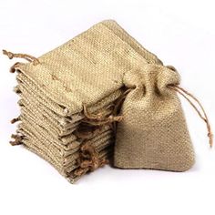 burlap bags are stacked on top of each other