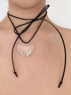 The necklace guaranteed to make your heart skip a beat - prepare to fall in love! Meet the limited edition 'FIRST DATE' suede wrap choker - featuring a large clear heart pendant strung alongside faux black suede leather, this piece will easily make a statement with any look! ♥ Made with a large clear glass heart pendan Trendy Adjustable Choker For Valentine's Day, Trendy Party Choker With Heart Pendant, Party Choker With Heart Pendant, Adjustable Heart Charm Choker For Party, Adjustable Heart Pendant Choker For Parties, Trendy Party Choker With Heart Charm, Trendy Heart Charm Choker For Party, Trendy Adjustable Choker With Heart Charm, Black Heart Pendant Choker