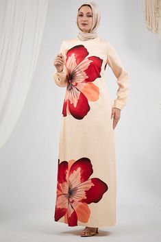 Elevate your wardrobe with the Blossom Elegance Maxi Dress, a perfect blend of sophistication and style. This stunning dress, crafted from durable crepe polyester, features a vibrant and bold floral design that exudes confidence and grace. The elegant long sleeves and high neck provide a modest yet fashionable look, perfect for any occasion. The dress is lined for added comfort and coverage, ensuring you feel as good as you look. The intricate floral pattern is strategically placed to enhance th