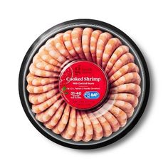 sliced shrimp in a bowl on a white background with the label labeled'cooked shrimp '