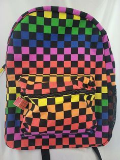 Brand New with Tags Spencer's Colorful Checker Backpack 17" x 13" x 6" (Size is approximate) Front zipper pocket with a Rubik's Cube zipper pull Mesh water bottle pocket on side Laptop pocket Shipping Included! FREQUENTLY ASKED QUESTIONS: Return Policy: We offer a 30-Day Money-Back Guarantee Shipping: Orders are shipped usually either same day or next business day Orders are shipped Monday - Friday via USPS, FedEx, and UPS Tracking information will be uploaded in eBay. Feedback: We take our repu Rubik's Cube, Backpack Brands, Shipping Orders, Laptop Pocket, Monday Friday, Front Zipper, Zipper Pocket, Return Policy, Water Bottle