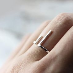 { P r o d u c t }A fun ring with an open design, perfect for everyday wear.{ M a t e r i a l s }- sterling silver{ D i m e n s i o n s }- 16 gauge wire (1.3mm)- 6mm and 12mm bars{ S i z e s }I can make this ring in sizes 3 to 15 (US), including half and quarter sizes.{S h i p p i n g }- Canada: We offer free shipping on all orders over CAD $40.- USA: All orders are shipped with a tracking number. USD $35+ orders ship free!{ P o l i c i e s }***Don't forget to take a look at our shop policies bef Artsy Accessories, Silver Ware, Silversmithing Jewelry, Silver Rings With Stones, Jewellery Inspiration, Classy Jewelry, Jewelry Model, Modern Ring, Rings Cool