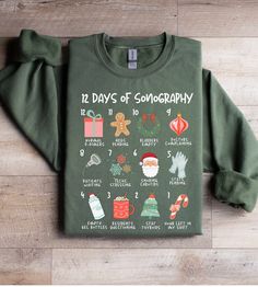 Introducing the Sonographer 12 Days of Christmas Sweatshirt. This whimsical design is perfect for ultrasound staff looking for the perfect sonography shirt for the holidays. This cozy crewneck makes the perfect gift for ultrasound techs, sonography students, or anyone in the ultrasound field. Give a thoughtful and practical gift that they'll love to wear on and off duty. ＤＥＴＡＩＬＳ📝 Our shirts are made to order, especially for you. Please check our color and size charts before you place your order. If you have any questions, message us to clarify. 📤ＨＯＷ ＴＯ ＯＲＤＥＲ📤 Choose your size and color. Add to Cart 📮ＳＨＩＰＰＩＮＧ📮 Your order will be ready to ship in 2-3 business days. First Class Mail 2-3 business days Express Shipping is available on some items. Message us if you have a deadline to meet. Ultrasound Shirt Ideas, Sonography Aesthetic, Gifts For Ultrasound Tech, Future Sonographer, Sonography Gifts, Cardiac Sonography Shirts, Ultrasound Tech Sweatshirt, Sonographer Gifts, Medical Sonography