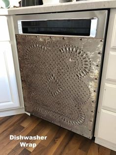 an old metal dishwasher in the kitchen