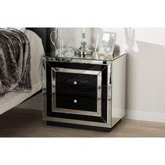 a black and silver nightstand with two drawers