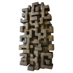 a sculpture made out of metal squares and rectangles on a white background,