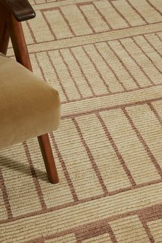 a chair sitting on top of a carpet covered floor