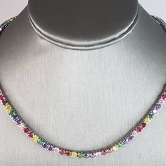 For Sale Is This Womens .925 Sterling Silver Modernist Rainbow Colored Glass Necklace. Necklace Weighs 25.6g. The Necklace Measures 18 3/4" Long By About 1/8" Wide. Makes A Great Gift For That Someone Special. If Any Questions, Please Ask. Be Sure To Check Out Our Other Items For Sale. Luxury Multicolor Necklaces For Anniversary, Multicolor Faceted Jewelry For Formal Occasions, Multicolor Hallmarked Necklace For Anniversary, Classic Multicolor Jewelry For Gifting, Classic Multicolor Jewelry For Gift, Classic Multicolor Jewelry Gift, White Gold Sterling Silver Necklace With Multi-stone, White Gold Sterling Silver Multi-stone Necklace, White Gold Multi-stone Sterling Silver Necklace