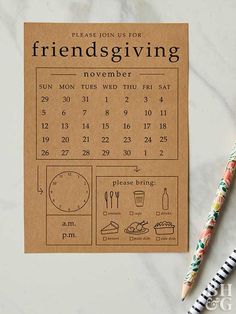 a calendar on a piece of brown paper next to two markers and a pen with the words, friends giving