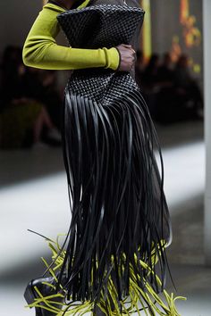 Bottega Veneta Fringe Crisscrossed clutch heightened the drama of Bottega Veneta's FW20 runway looks, and it will have the same effect on your own ensembles. Exaggerated lamb leather fringing adds tactile interest to this black style, which is fashioned in the house's signature intrecciato weave and secured with a frame fastening. The couch internal details: leather lining, colour of fastening: gold Height 35cm-14" Min. width 16cm-6.5" Max. width 30cm-12" Min. depth 2cm-1" Max. depth 16cm-6.5" L Daniel Lee Bottega Veneta, Robes Design, Handbag Collection, White Tassel, Inspirational Design, Eclectic Design, Vogue Paris, Hand Bags, Ladies Party