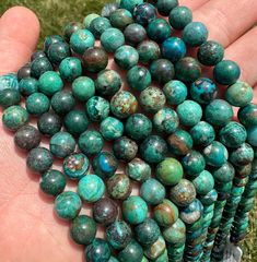 This listing is for a single (1) Chrysocolla Bead Strand from Arizona.  Size: You choose 7mm or 9mm. Please note that these are stock photos of a few of the Polished Chrysocolla Bead strands that we have available. These are natural Chrysocolla Crystals & Gemstones, so each stone will be unique and have variations in natural characteristics such as Size, Shape, Inclusions, and Color. Crystal Mineral(s): Chrysocolla  Origin: Arizona    Bead Size (Approximate): Multiple Sizes Available - You Choos Taurus Element, Chrysocolla Crystal, Les Chakras, Holistic Healing, Beads For Jewelry, Crystals Minerals, Bead Strand, Color Crystal, Crystals And Gemstones