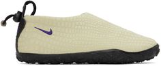 the nike air footwear is white and purple