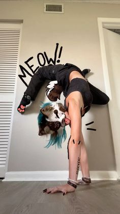 a woman is upside down on the floor