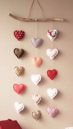 a group of hearts hanging on a wall