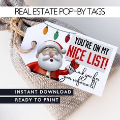 an image of a christmas card with santa clause on it and the text instant printable for real estate pop - up tags