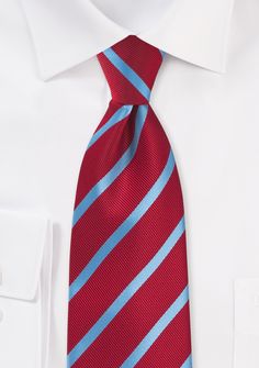 Looking for a stylish necktie to complement your suit for a wedding or formal event? Consider the Tomato Red and Cornflower Blue Repp&Regimental Striped Necktie! This versatile necktie is perfect for adding a pop of color to a classic navy or gray suit, or for pairing with a tuxedo for a sophisticated look. Its bold stripes in tomato red and cornflower blue will add a touch of personality to any ensemble. So if you're shopping for suits or accessories for your next formal occasion, be sure to ad Suit For A Wedding, Regimental Stripe, Red And Light Blue, Burgundy Tie, Tie Matching, Blue Necktie, Orange Tie, Yellow Ties, Stripe Silk